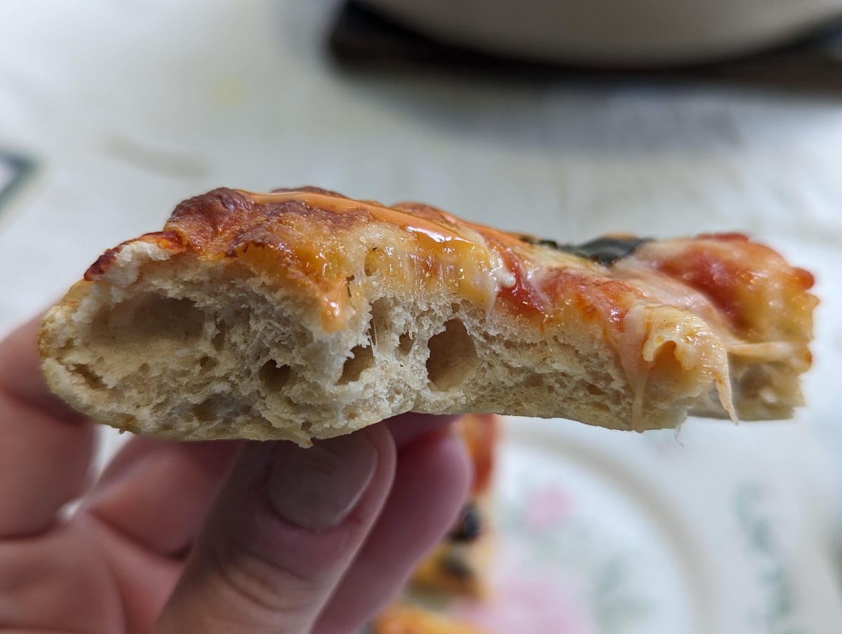 bite taken out of dough showing off perfect structure