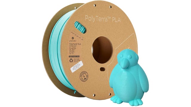 Bright blue filament with a penguin model