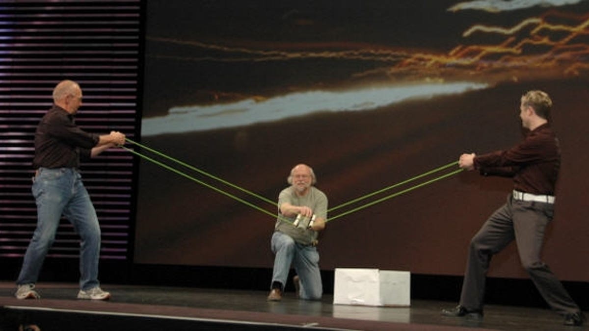 James Gosling, the so-called father of Java, catapults T-shirts toward the JavaOne audience.
