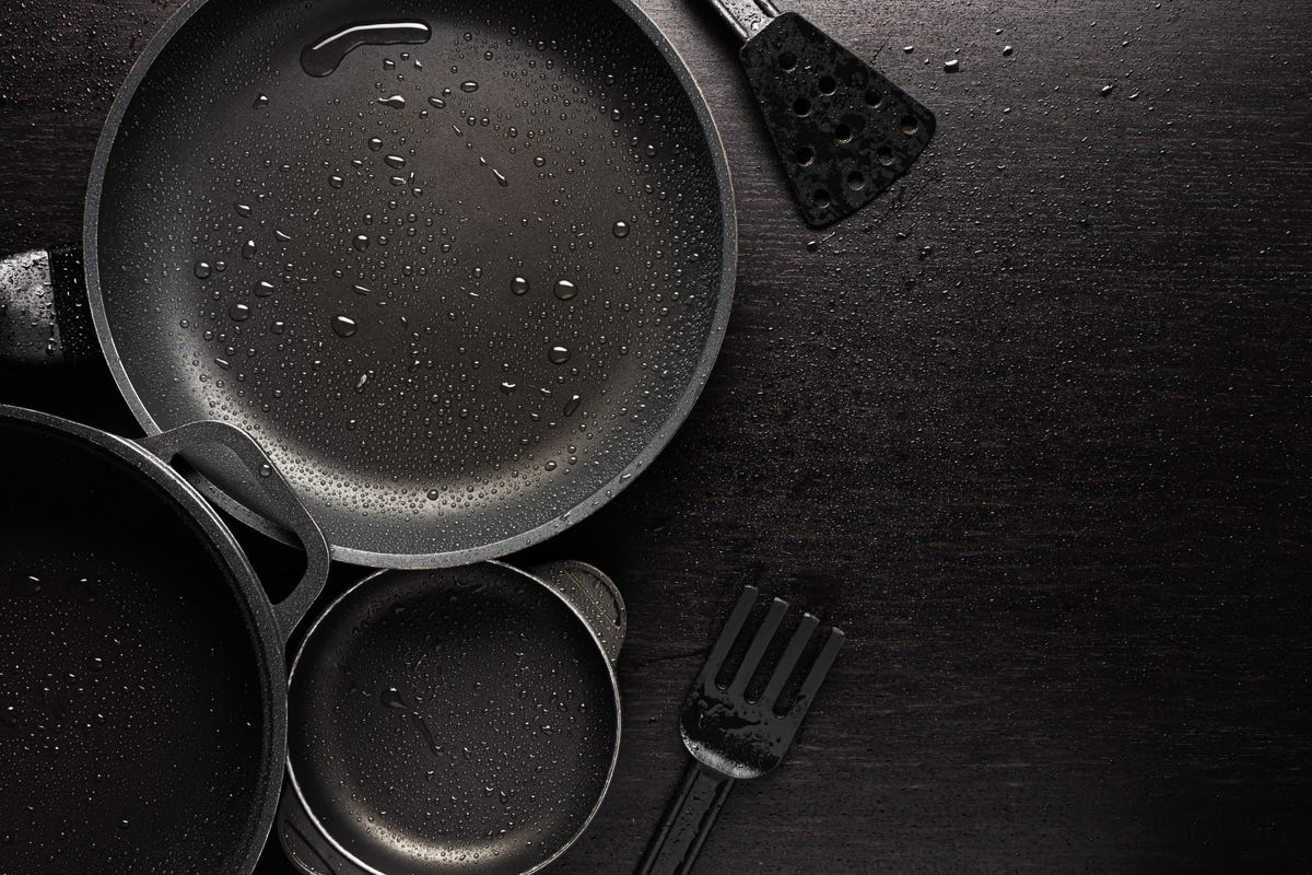 Non-stick cookware with water droplets on the surface