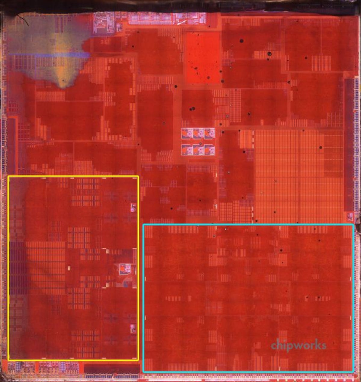 Die photo of A7: Anandtech speculates that blocks within the yellow border comprise the dual-core Apple A7 CPU.
