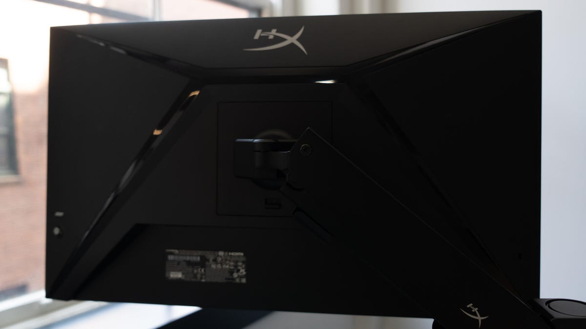 The rear of the HyperX Armada 27 gaming monitor showing the arm and mount