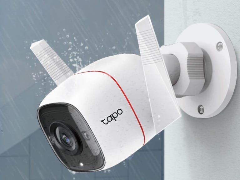 The Tapo C310 camera mounted on outside trim with graphics of rain falling on it.