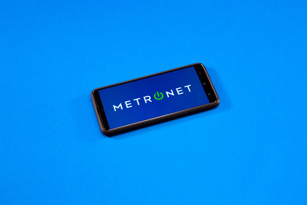 Metronet logo on a mobile phone on a blue background