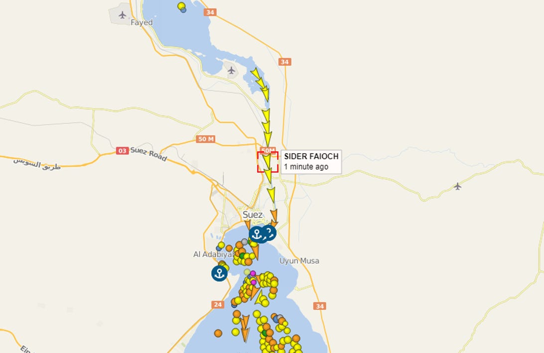 Screenshot of a real-time tracker showing ships and the Suez Canal.