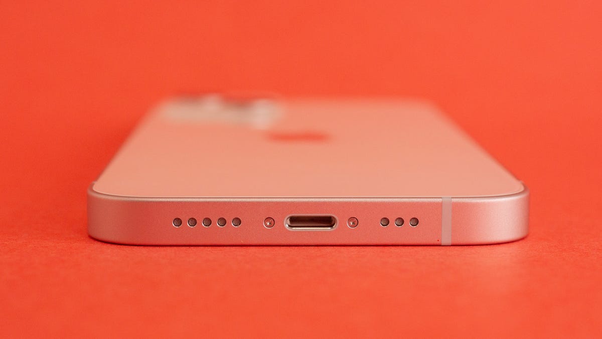 The iPhone 13, looking at its Lightning charging port