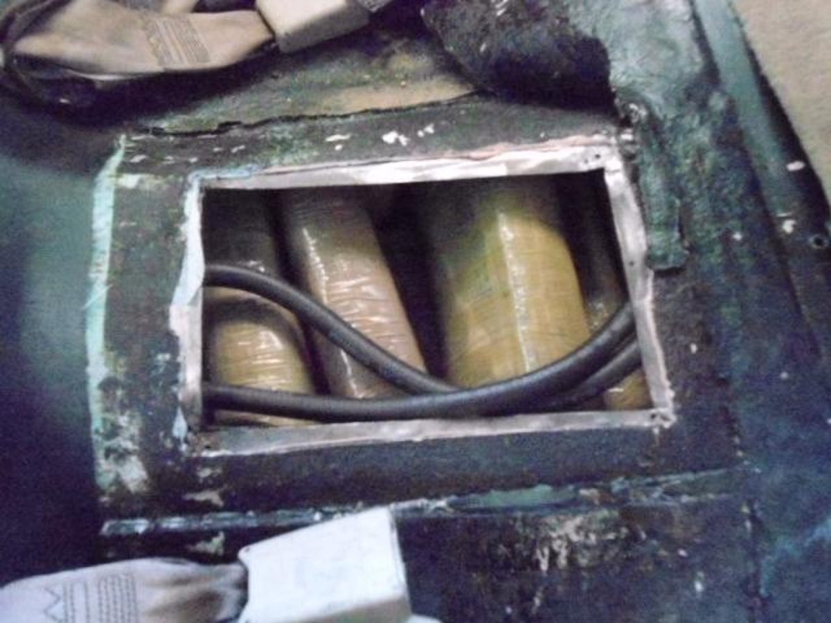 SYS_Marijuana_in_Gas_Tank_--_Seeing_Packages_in_Compartment.JPG