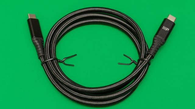 Monoprice's AtlasFlex USB-C charging and data cable, coiled on a green background