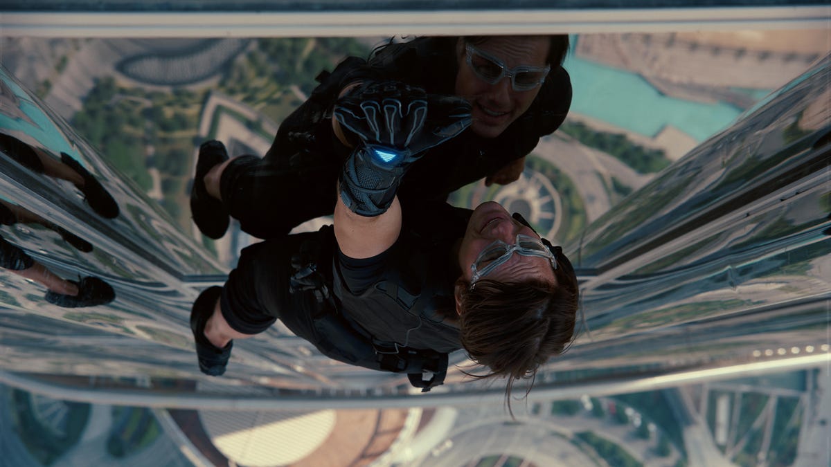 Ethan Hunt climbs the Burj Khalifa in Mission: Impossible -- Ghost Protocol, one of the series' wild stunts that showcases a cool gadget.