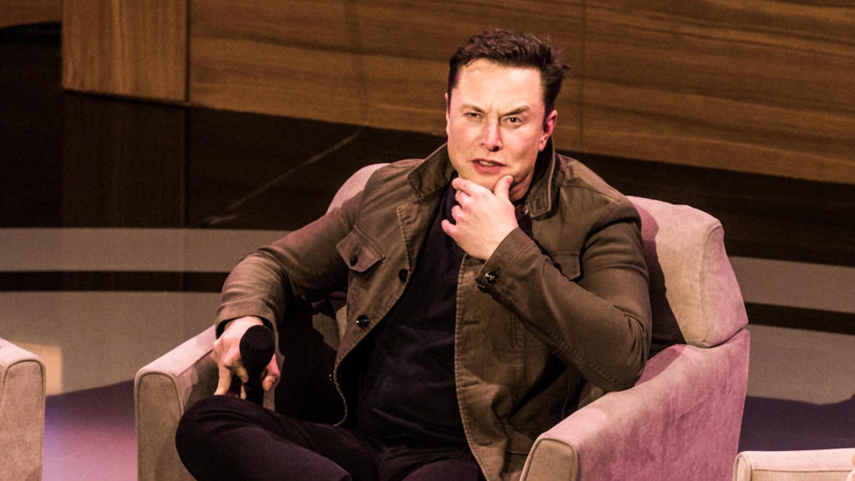 Billionaire Elon Musk at a conference
