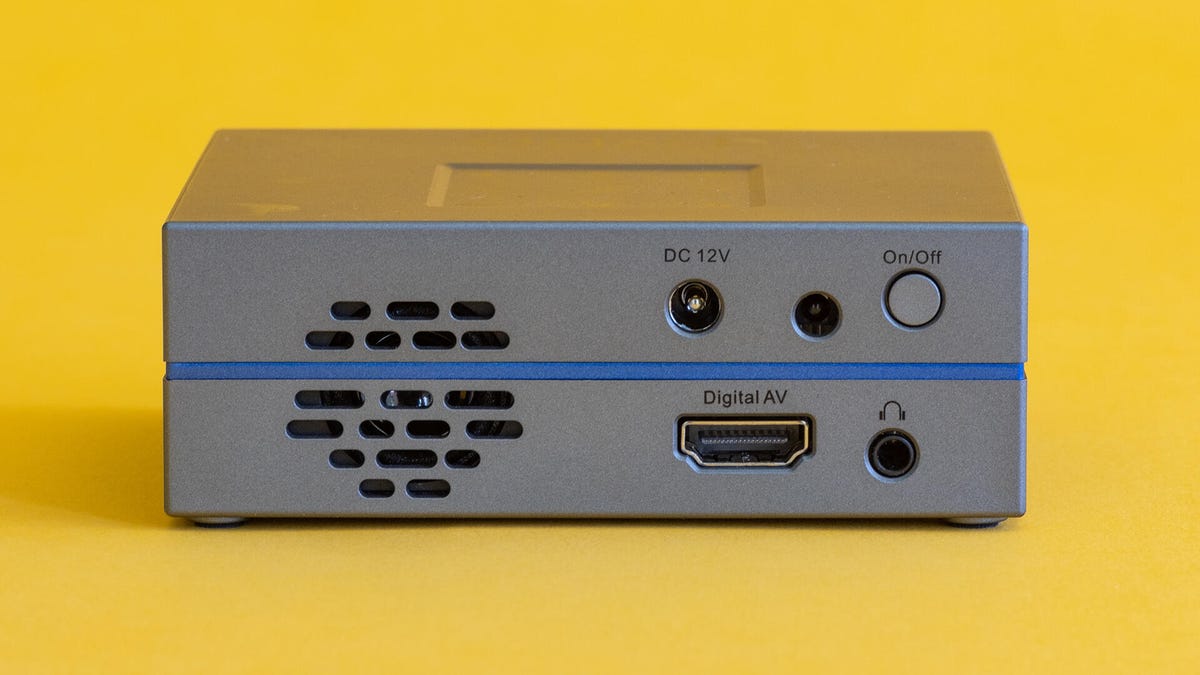The AAXA P8's back panel, with an HDMI input and headphone output.