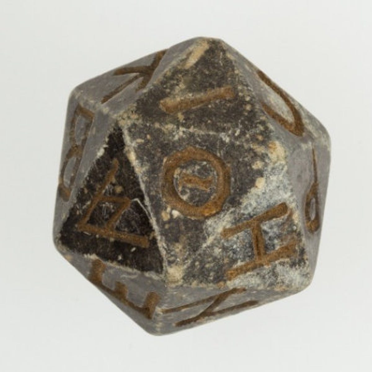 Ancient d20 die emerges from the ashes of time - CNET