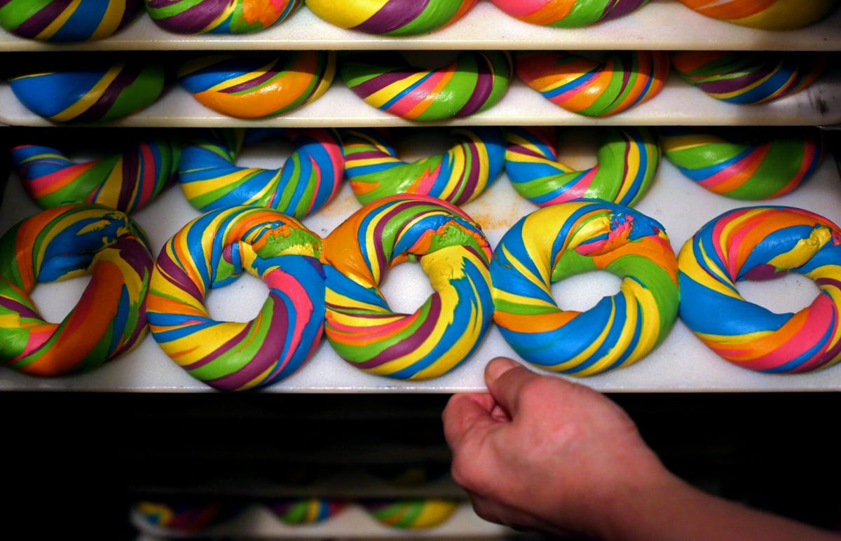 BROOKLYN, NY - APRIL 09: A tray of baked Rainbow Bagels is seen