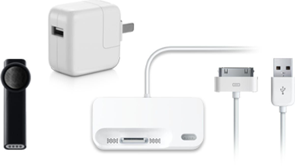 Apple accessories, including a Bluetooth headset and an iPhone dock