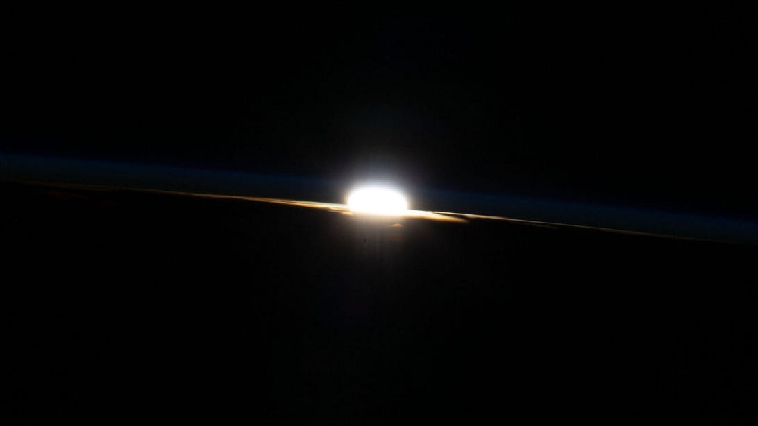 Soul-Stirring Orbital Sunset Shines Over Earth in NASA Image thumbnail