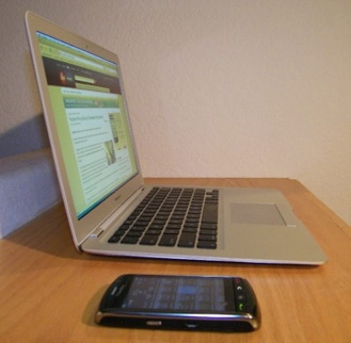 The MacBook Air can use the Blackberry Storm as a Bluetooth 3G modem