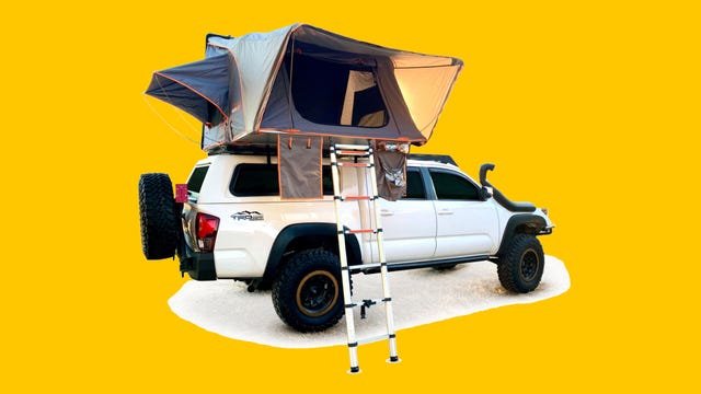 Roofnest Condor XL rooftop tent mounted on a white Toyota pickup truck