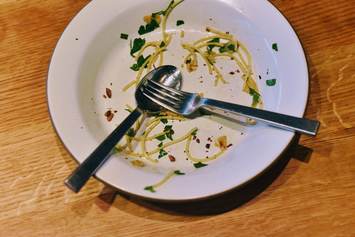 Eaten plate of spaghetti
