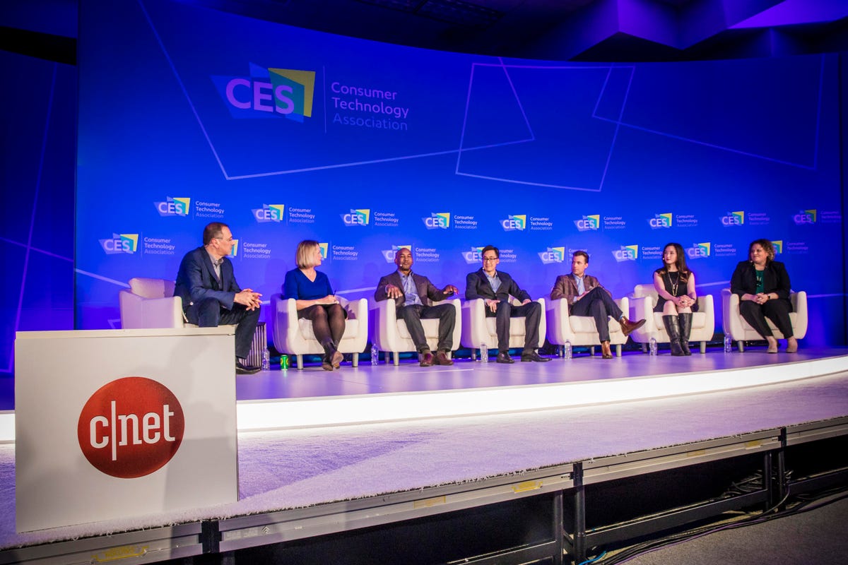 Panelists sit in a row onstage at CES. (Left to Right) Panel moderators Brian Cooley and Lindsey Turrentine of CNET sit next to Ian Tong, Chief Medical Officer at Doctor On Demand; David Rhew, chief medical officer and head of healthcare and fitness at Sa