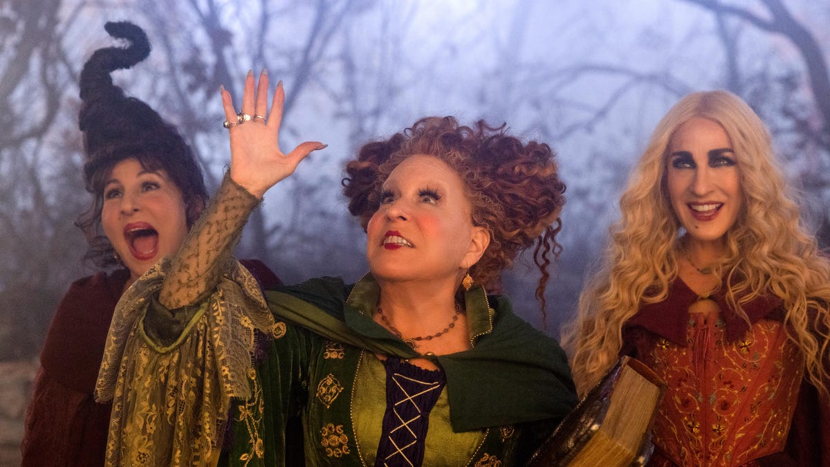 Kathy Najimy, Bette Midler and Sarah Jessica Parker in outrageous witch outfits.