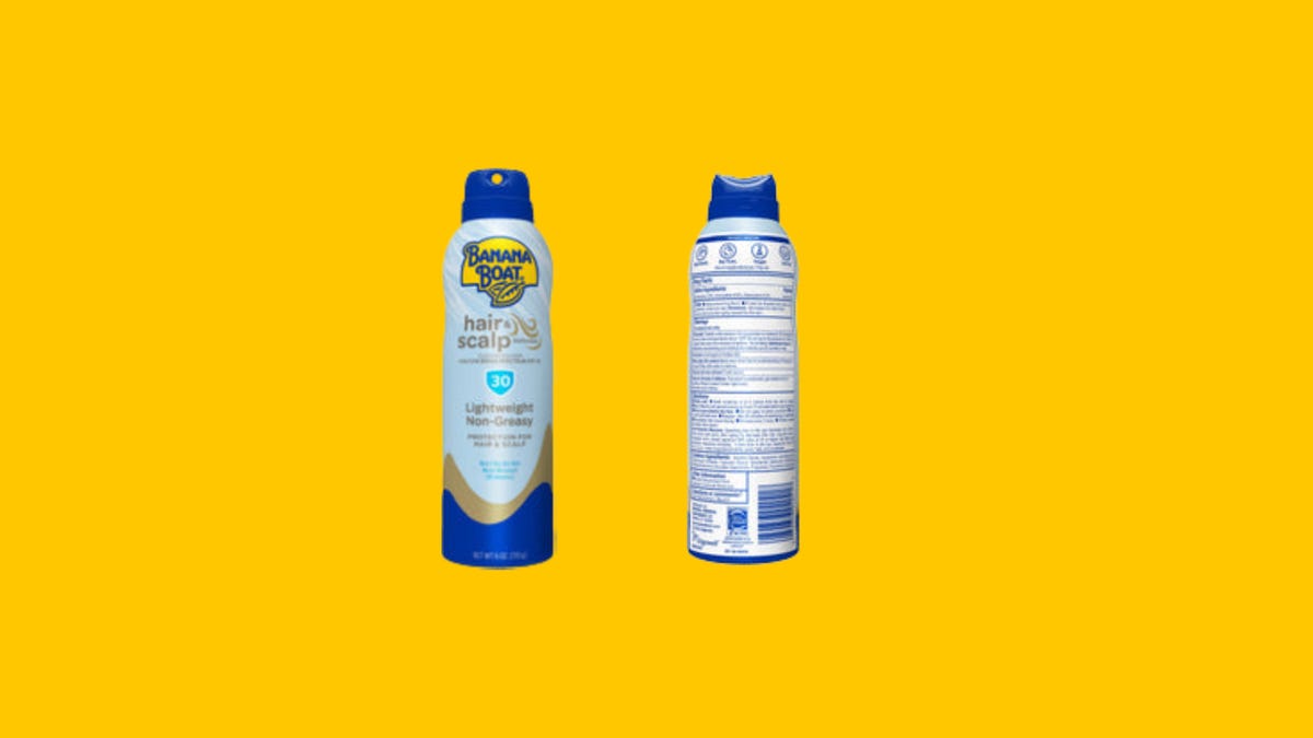 The front and back of an aerosol can of Banana Boat Hair & Scalp Sunscreen Spray SPF 30, which has a dark blue lid and a light blue body