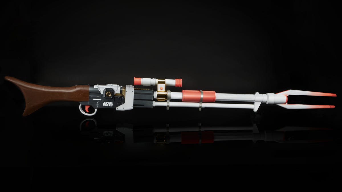 The Nerf replica of the Amban Phase-pulse blaster rifle used in The Mandalorian against a black background.