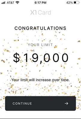 Gold confetti falls down over a screen that says "Congratulations, your limit is $19,000"