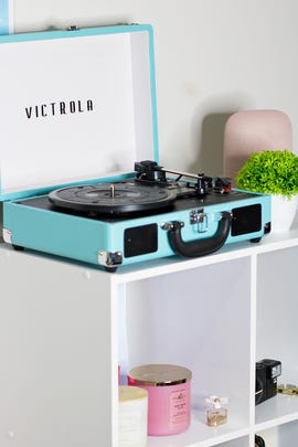 Victrola record player on a bookshelf