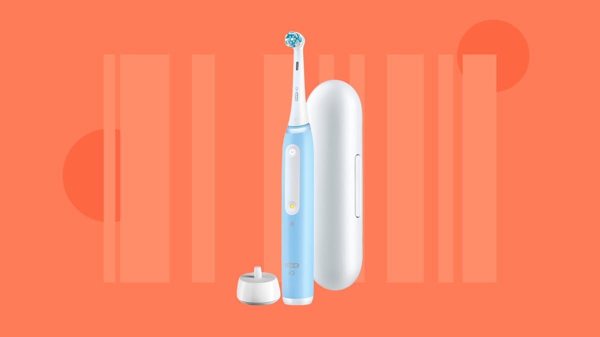 The Oral-B iO Series 4 electric toothbrush is displayed against an orange background.