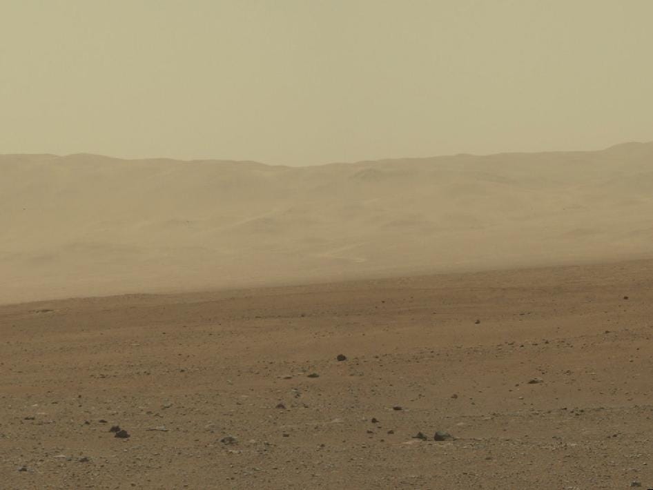 This color image from NASA's Curiosity rover shows part of the wall of Gale Crater, the location on Mars where the rover landed on Aug. 5, 2012 PDT.