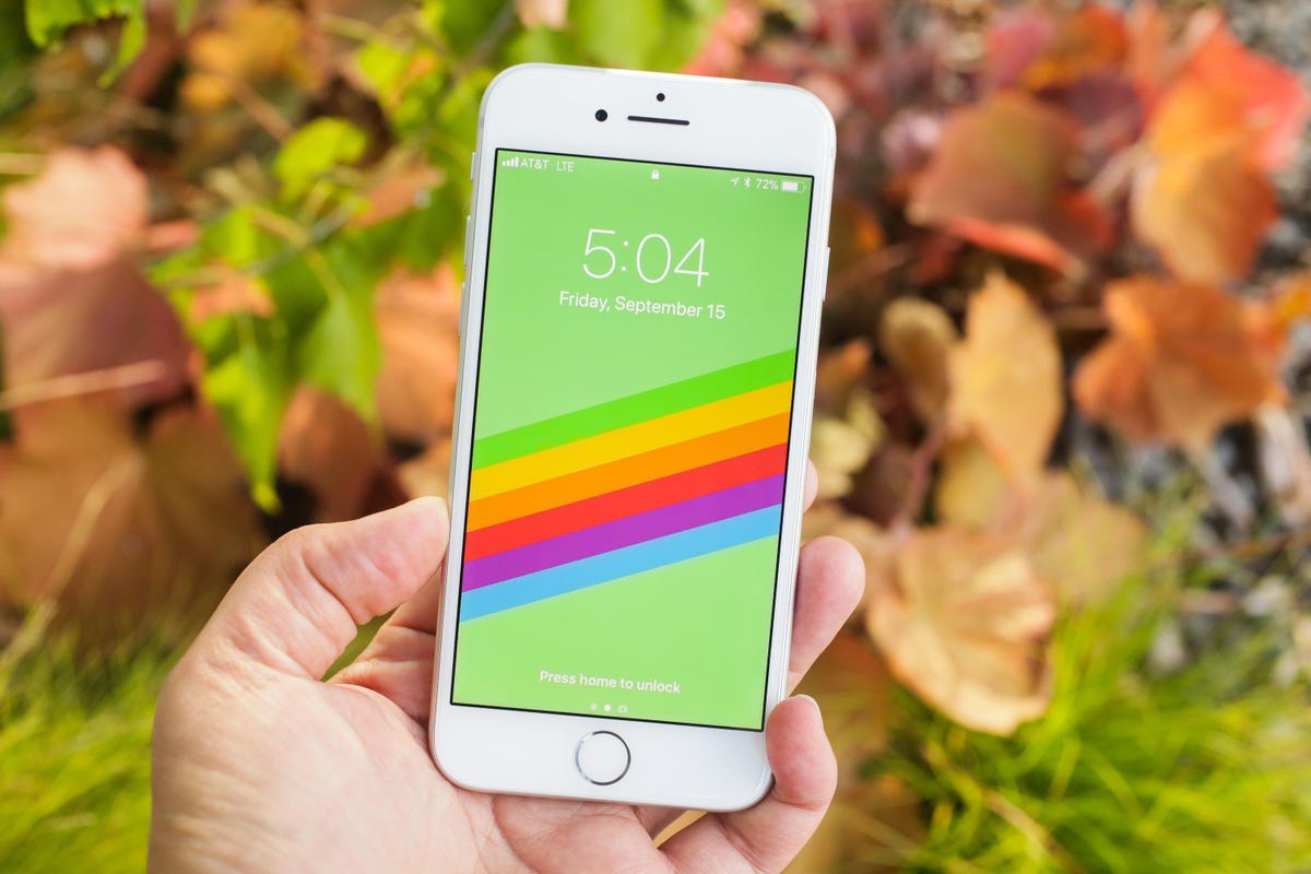iPhone 8 with rainbow background