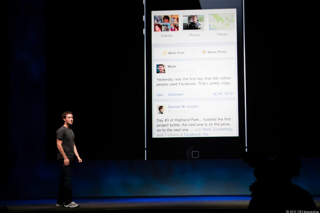 Zuckerberg shows off how Facebook's new Timeline looks on a mobile device.