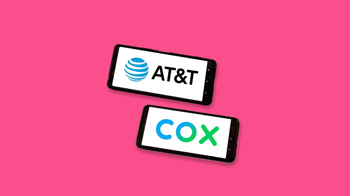 Two phones, one with the AT&T logo and other with the Cox logo.