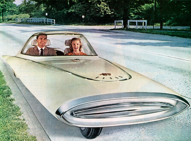 Vintage illustration of a futuristic three-wheeled self-driving "dream car," 1961.