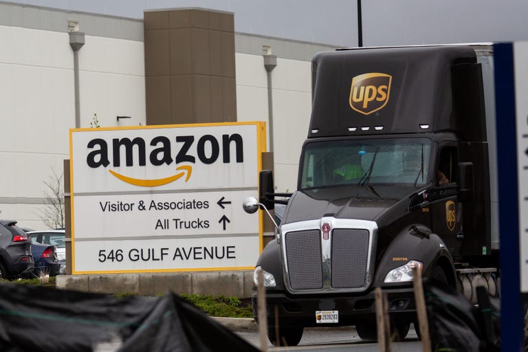 UPS truck at an Amazon warehouse