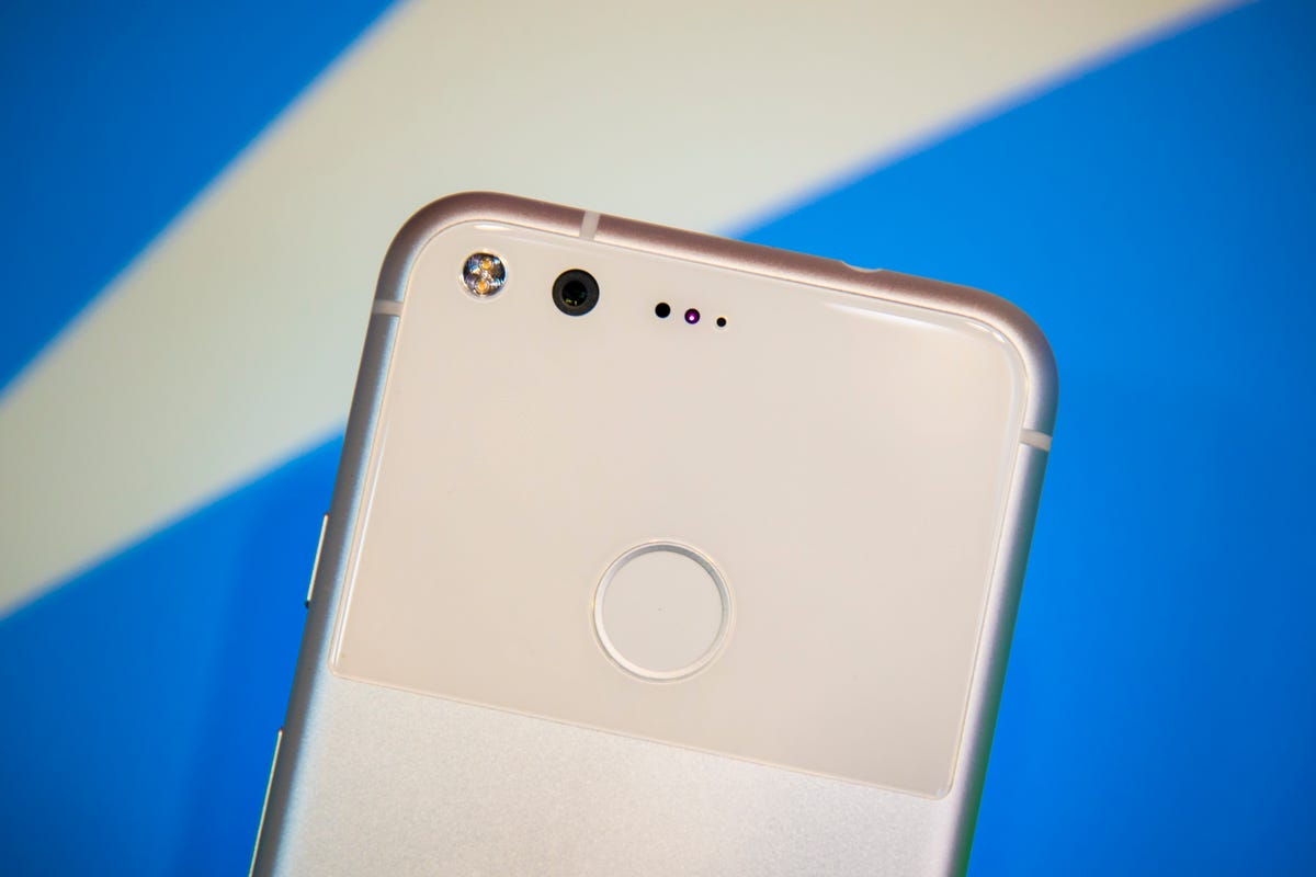 At the upper middle of the Pixel back is a fingerprint reader. When you swipe it, it both unlocks the phone and shows your recent notifications.