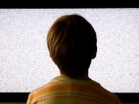 <p>Boy in front of offline TV</p>
