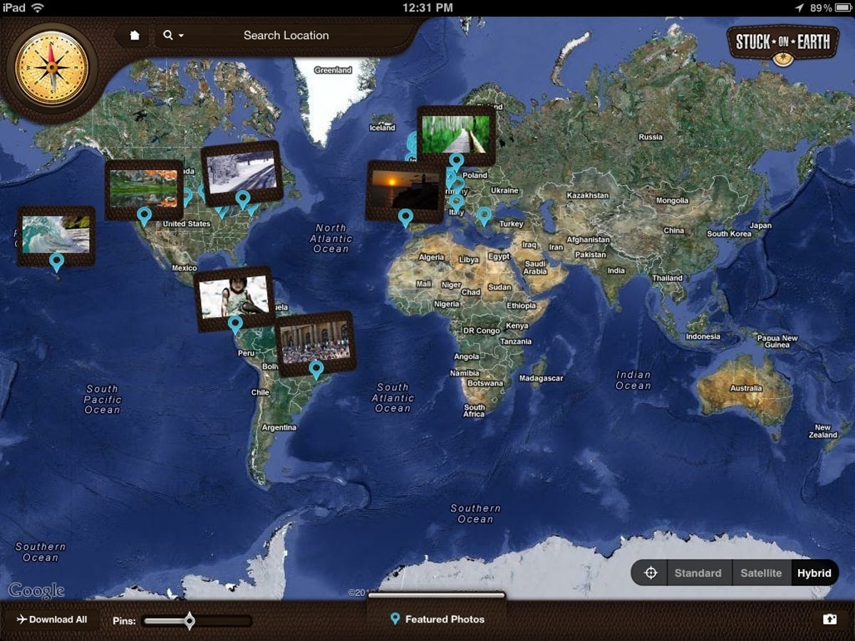 Stuck on Earth world map with pinned photo collections