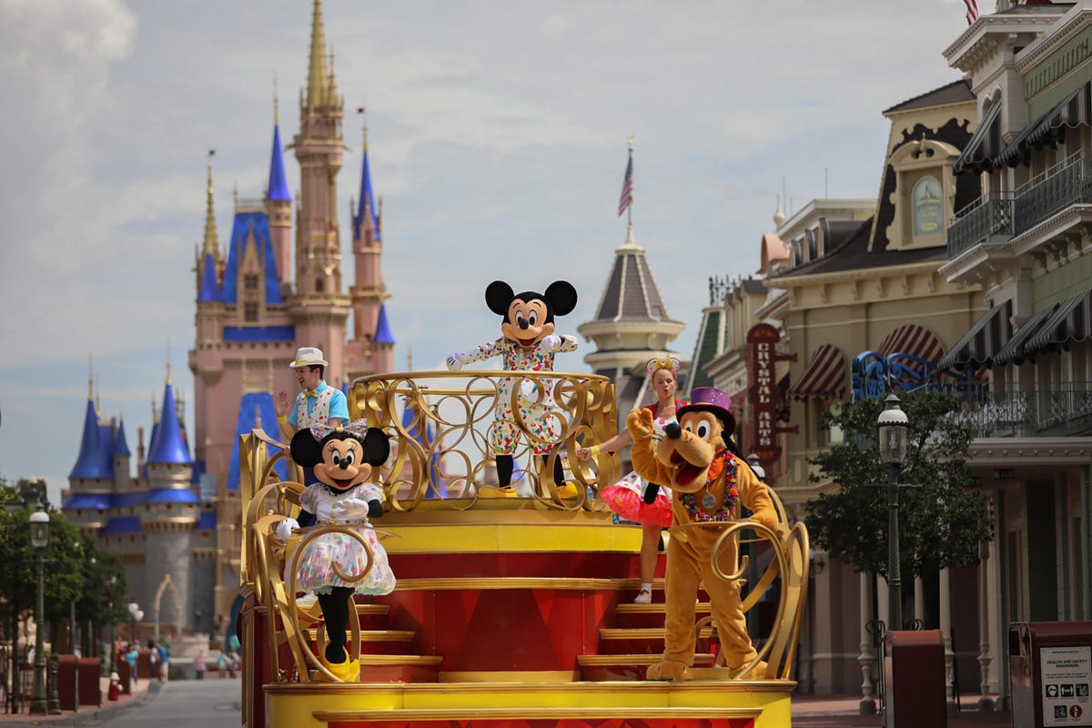 Disney World reopening guests face masks Mickey cavalcade