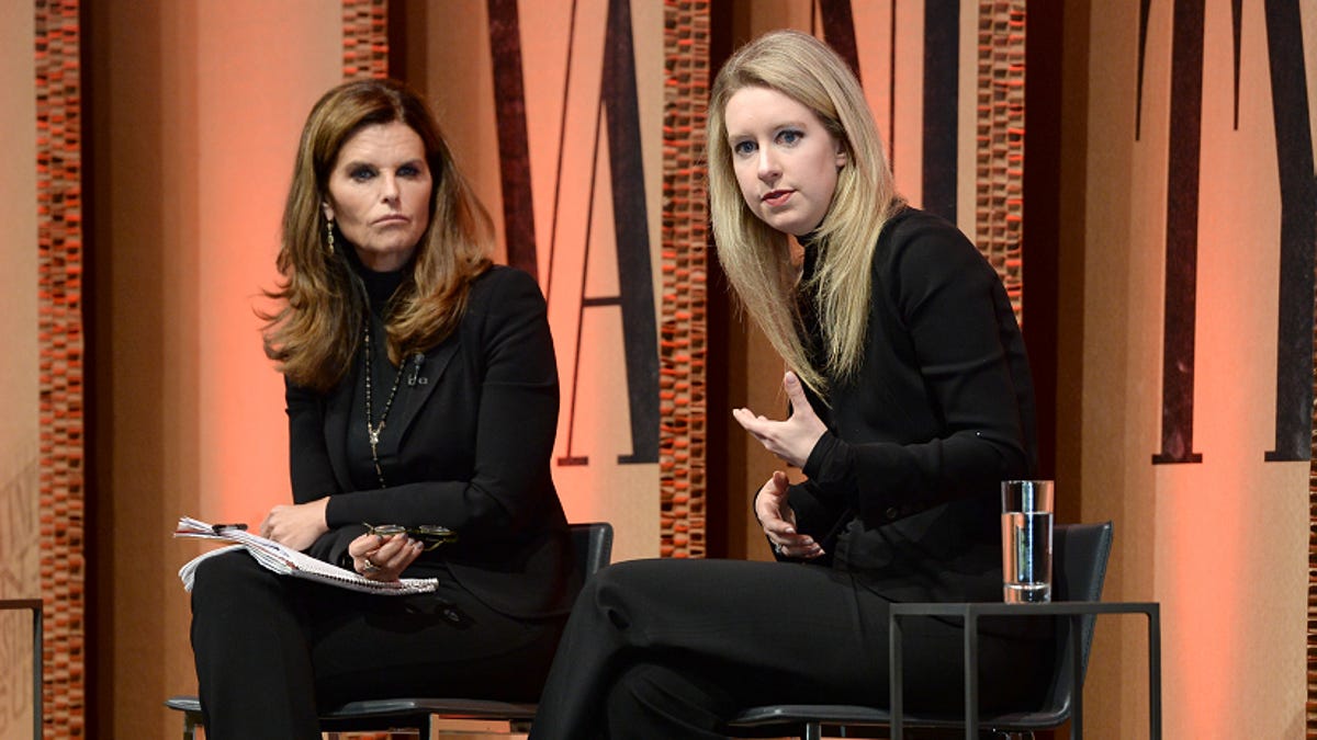 Theranos CEO Elizabeth Holmes (right) speaks onstage with NBC News Special Anchor Maria Shriver in 2015.