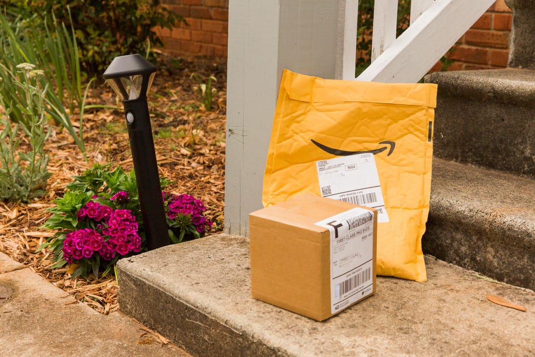 mail-packages-usps-fedex-amazon-ups-doorstep-mailbox-letters-shipping-coronavirus-stay-at-home-2020-cnet
