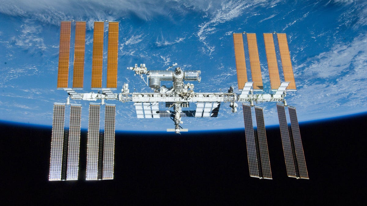 The International Space Station, with Earth in the background.