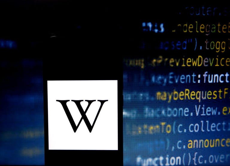 Wikipedia logo and computer code