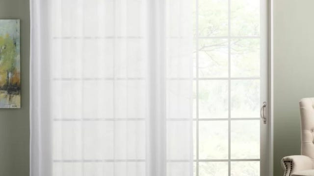 sheer curtains hanging across a window