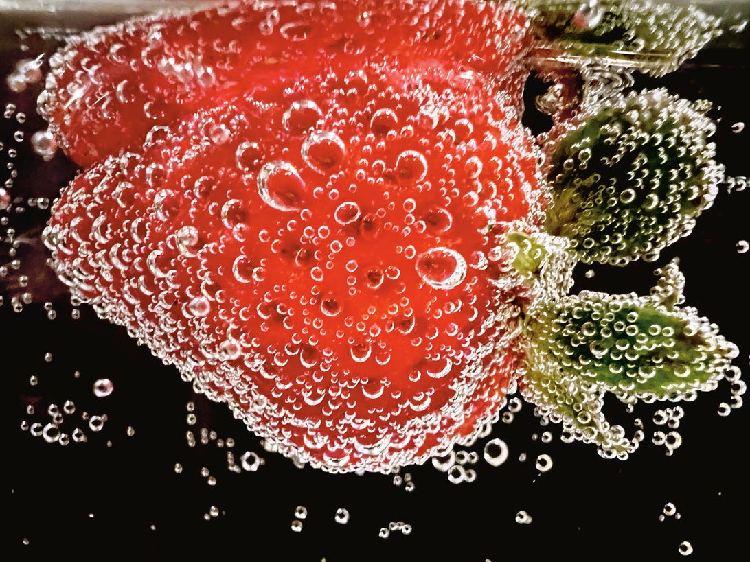 A macro shot of a strawberry.