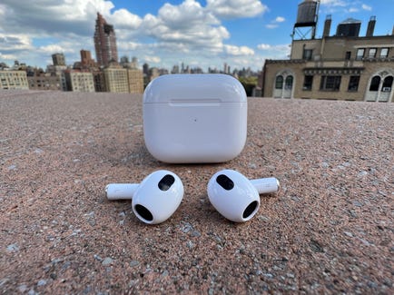 Apple AirPods 3rd gen on concrete