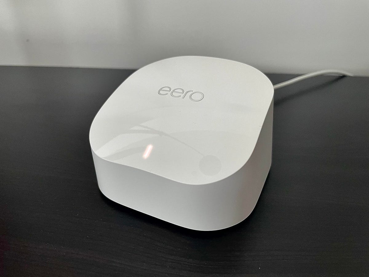 An Eero mesh router on a table.