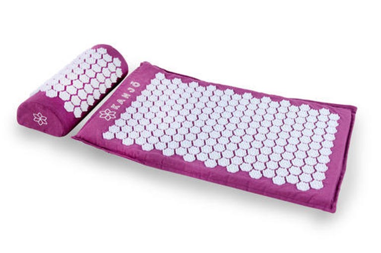 A pink acupressure pad