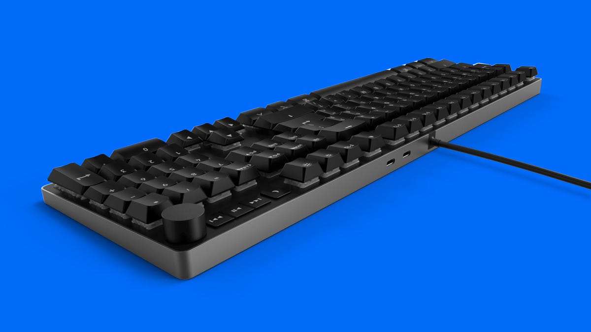Das Keyboard MacTigr wired mechanical keyboard back with two USB-C ports on a blue background