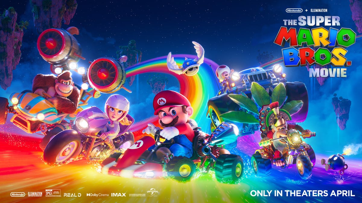 Donkey Kong, Peach, Mario, Toad and Cranky drive along Rainbow Road.